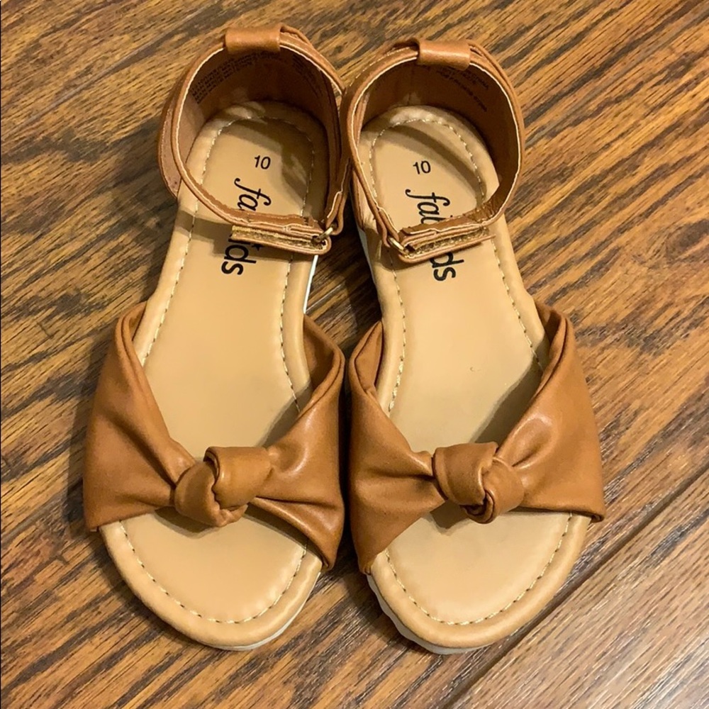 Brand new never work brown sandals